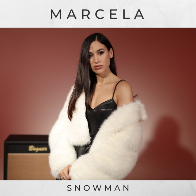 Dengarkan lagu Snowman nyanyian Marcela dengan lirik