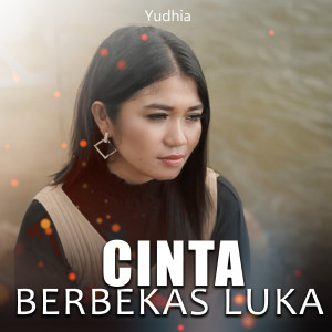 Dengarkan CINTA BERBEKAS LUKA lagu dari Yudhia dengan lirik