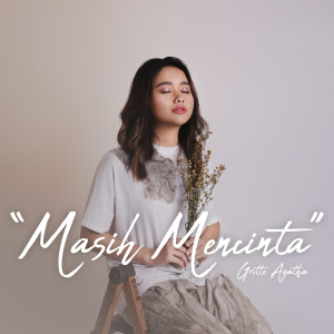 收聽Gritte Agatha的Masih Mencinta歌詞歌曲