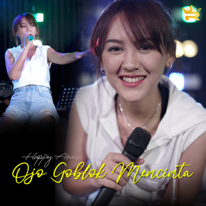 Listen to Ojo Goblok Mencinta song with lyrics from Happy Asmara