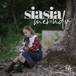 Dengarkan Sia Sia Merindu lagu dari Tata dengan lirik