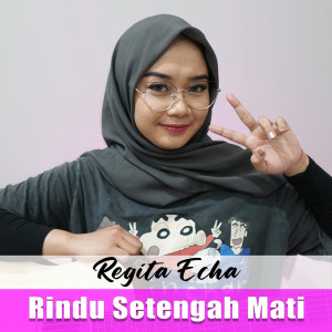 Dengarkan Rindu Setengah Mati lagu dari Regita Echa dengan lirik