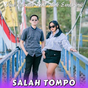 Listen to Salah Tompo song with lyrics from Dini Kurnia