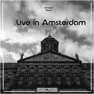 Dengarkan lagu Live in Amsterdam nyanyian Tavron dengan lirik