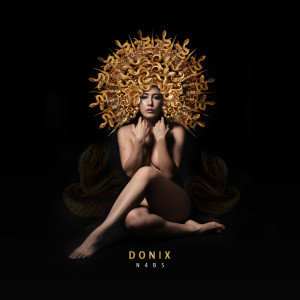 Dengarkan lagu La La La nyanyian Donix dengan lirik