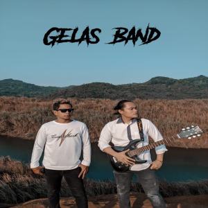 Dengarkan Lagu Rindu lagu dari Gelas Band dengan lirik