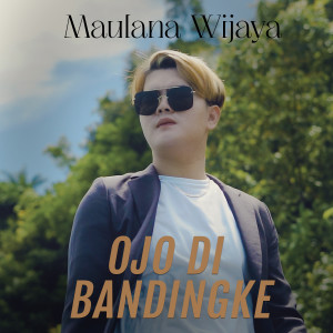 Listen to Ojo Di Bandingke song with lyrics from Maulana Wijaya