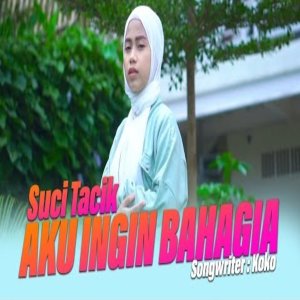 Dengarkan Aku Ingin Bahagia lagu dari Suci Tacik dengan lirik