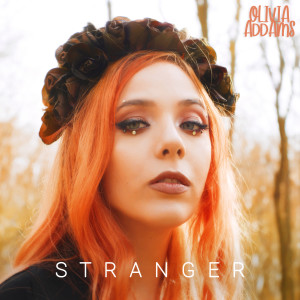 Dengarkan Stranger lagu dari Olivia Addams dengan lirik