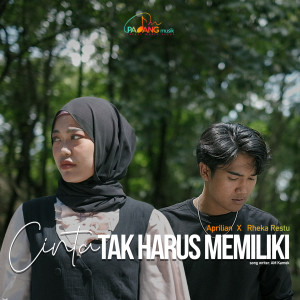 Dengarkan lagu Cinta Tak Harus Memiliki nyanyian Aprilian dengan lirik
