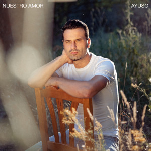 Listen to Nuestro Amor song with lyrics from Ayuso
