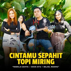 Dengarkan Cintamu Sepahit Topi Miring lagu dari Nabila Cahya dengan lirik
