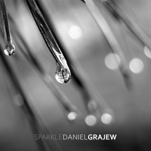 ดาวน์โหลดและฟังเพลง Sparkle พร้อมเนื้อเพลงจาก Daniel Grajew