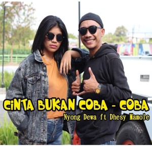 Listen to Cinta Bukan Coba-Coba song with lyrics from Dhesy Mamole