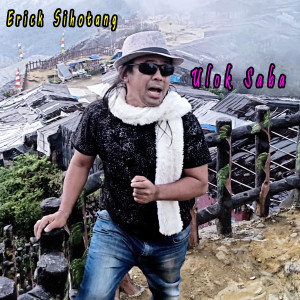 Listen to ULOK SABA song with lyrics from Erick Sihotang