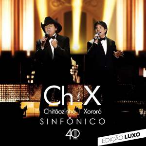 Listen to Fogão de Lenha (Ao Vivo) song with lyrics from Chitãozinho & Xororó