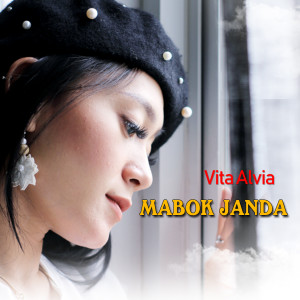 Listen to Mabok Janda song with lyrics from Vita Alvia