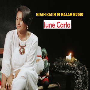 Dengarkan lagu Kisah Kasih Di Malam Kudus nyanyian June Carla dengan lirik