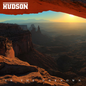 Dengarkan In the Unknown lagu dari Hudson dengan lirik