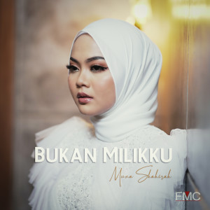 Dengarkan lagu Bukan Milikku nyanyian Muna Shahirah dengan lirik