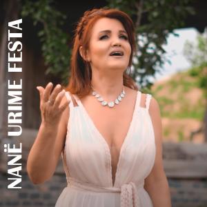 Listen to Nanë urime festa song with lyrics from Vjollca Buqaj