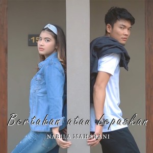 Listen to Bertahan Atau Lepaskan song with lyrics from Nabila Maharani