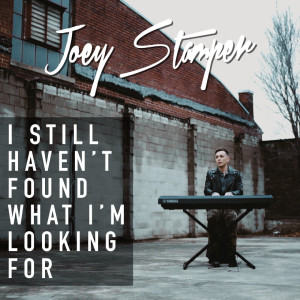 Dengarkan I Still Haven't Found What I'm Looking For lagu dari Joey Stamper dengan lirik