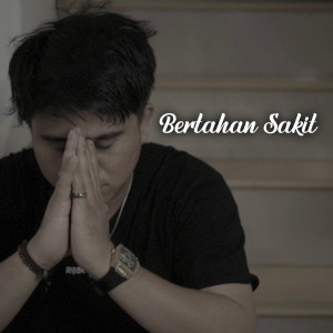 Dengarkan Bertahan Sakit lagu dari Ali dengan lirik
