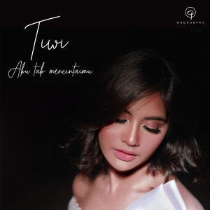 Dengarkan Aku Tak Mencintaimu lagu dari Tiwi dengan lirik