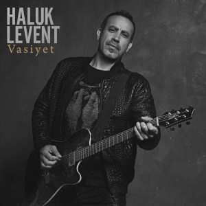 收听Haluk Levent的Ah Bir Ateş Ver歌词歌曲