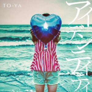 ดาวน์โหลดและฟังเพลง Identity พร้อมเนื้อเพลงจาก TO-YA