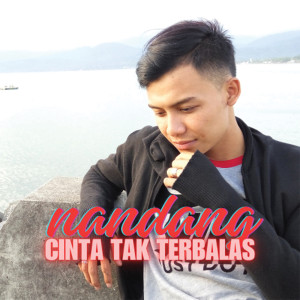 Dengarkan lagu Cinta Tak Terbalas nyanyian Nandang dengan lirik
