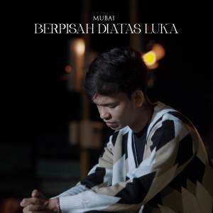 收聽Mubai的Berpisah Diatas Luka歌詞歌曲