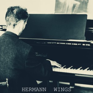 Listen to Wings song with lyrics from Hermann