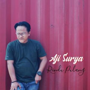 Dengarkan Rindu Pulang lagu dari Aji Surya dengan lirik