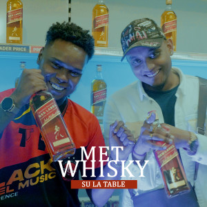 Dengarkan lagu Met whisky su la table nyanyian Mitrix dengan lirik