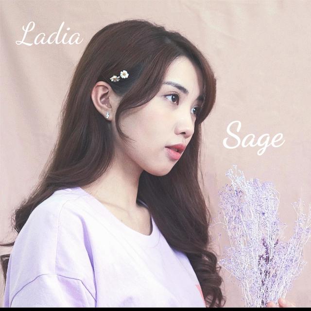 Listen to 日冕 (希望版) song with lyrics from 王立婷