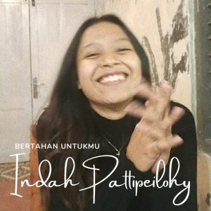 收聽Indah Pattipeilohy的Bertahan Untukmu歌詞歌曲