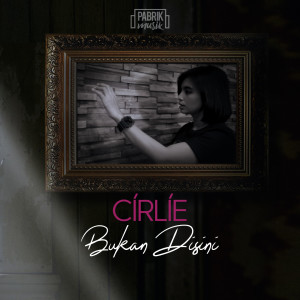 Dengarkan lagu BUKAN DISINI nyanyian CIRLIE dengan lirik
