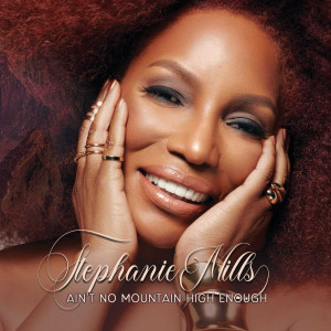 收聽Stephanie Mills的Ain't No Mountain High Enough歌詞歌曲