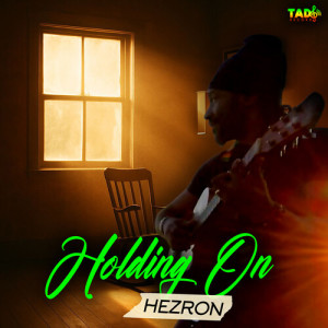 Listen to Holding On song with lyrics from Hezron
