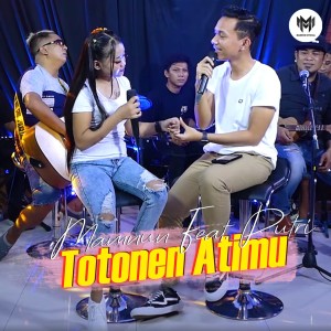Dengarkan lagu Totonen Atimu nyanyian Mamnun dengan lirik