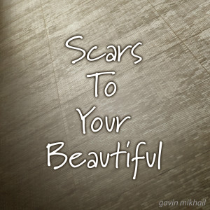 Dengarkan lagu Scars To Your Beautiful nyanyian Gavin Mikhail dengan lirik