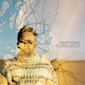 收聽Mads Klindt Poulsen的Øjeblikke歌詞歌曲