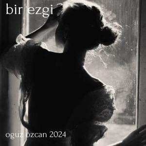 收聽Oğuz Özcan的Bir Ezgi歌詞歌曲