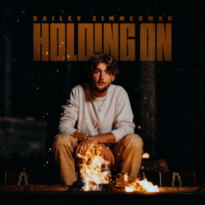ดาวน์โหลดและฟังเพลง Holding On พร้อมเนื้อเพลงจาก Bailey Zimmerman