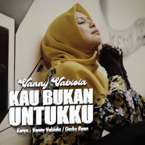 Dengarkan Kau Bukan Untukku lagu dari Vanny Vabiola dengan lirik