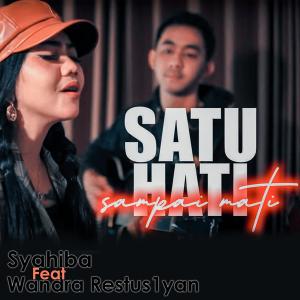 Dengarkan lagu Satu Hati Sampai Mati Feat. Wandra Restus1yan nyanyian Syahiba Saufa dengan lirik