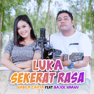 Dengarkan lagu Luka Sekerat Rasa nyanyian Nabila Cahya dengan lirik