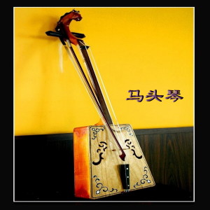 Dengarkan 棕色的袍裙 lagu dari 扎登巴巴图 dengan lirik